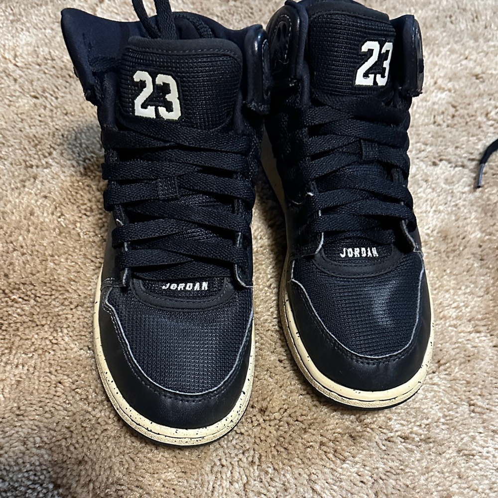 Jordan Black and White High-Top Sneakers